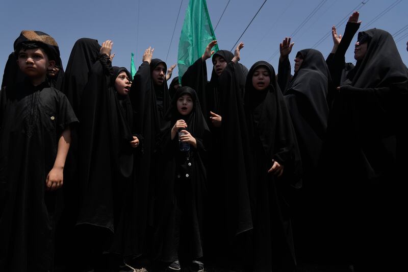 Mourners at a ceremony in Tehran. Photograph: Vahid Salemi/AP