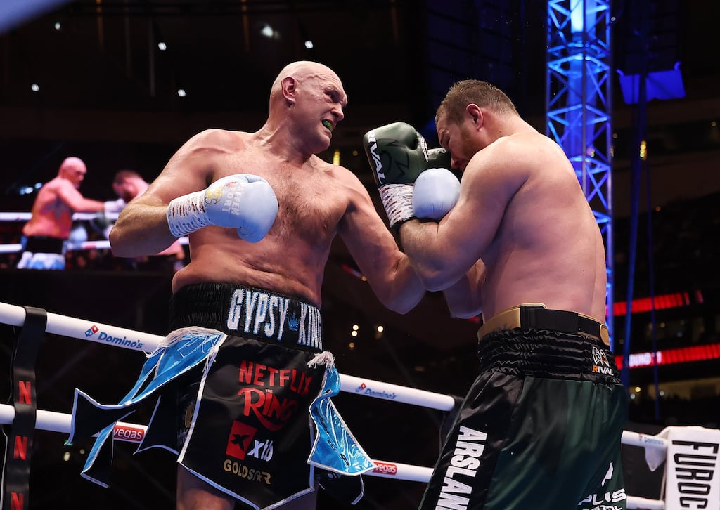 Tyson Fury punches Arslanbek Makhmudov during their heavyweight fight at Tottenham Hotspur Stadium on Saturday. Photograph: Richard Pelham/Getty Images for Netflix