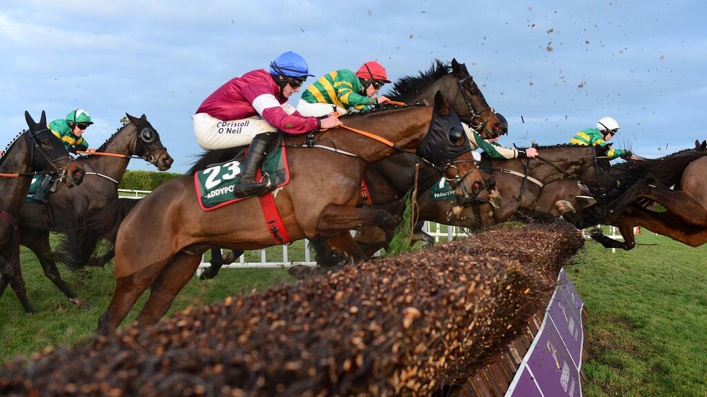 Roaring Bull and Jack Kennedy (blue cap) on the way to winning the Paddy Power Chase  during day two of the Christmas festival at Leopardstown. Photograph:  PA Wire