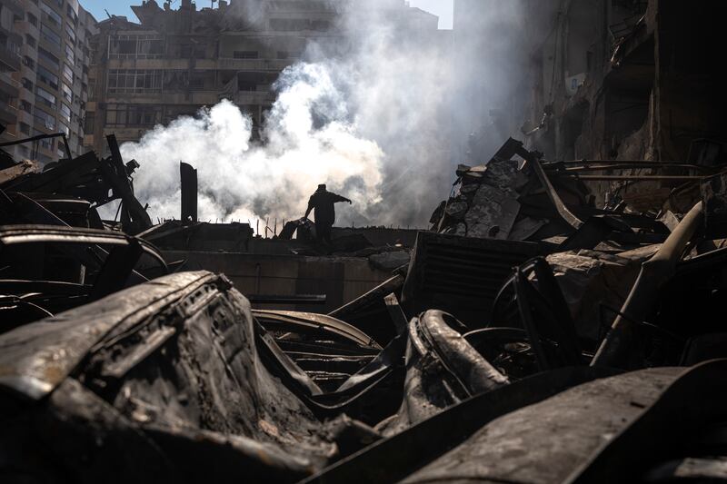 Rescue workers at the site of an air strike in the Corniche El Mazraa area of Beirut on Thursday. Photograph: Diego Ibarra Sánchez/The New York Times