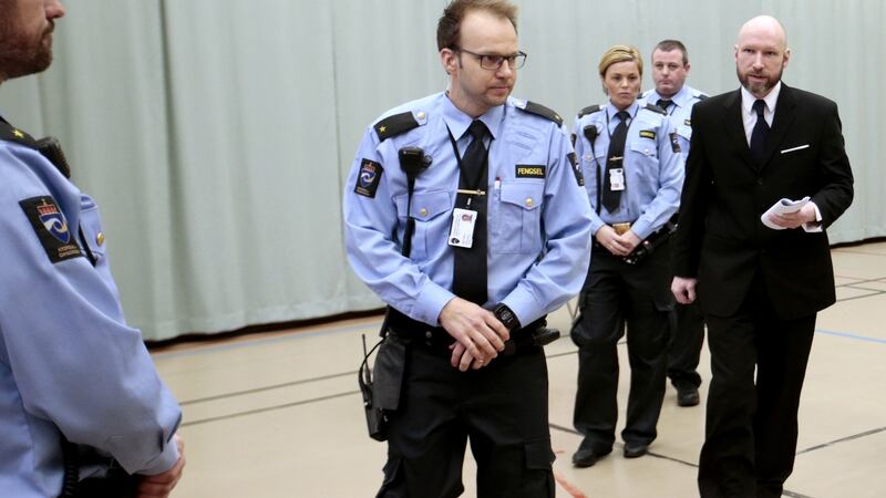 Anders Behring Breivik, escorted by police officers, enters the courtroom on the third day of his appeal case in Borgarting Court of Appeal at Telemark prison in Skien, on January 12th, 2017. Photograph: Photograph: Lise Aaresud/AFP via Getty Images