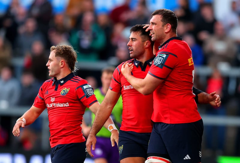 Munster's Dan Kelly (centre) celebrates scoring a try with team-mates Craig Casey and Tadhg Beirne. Photograph: Tom O’Hanlon/Inpho