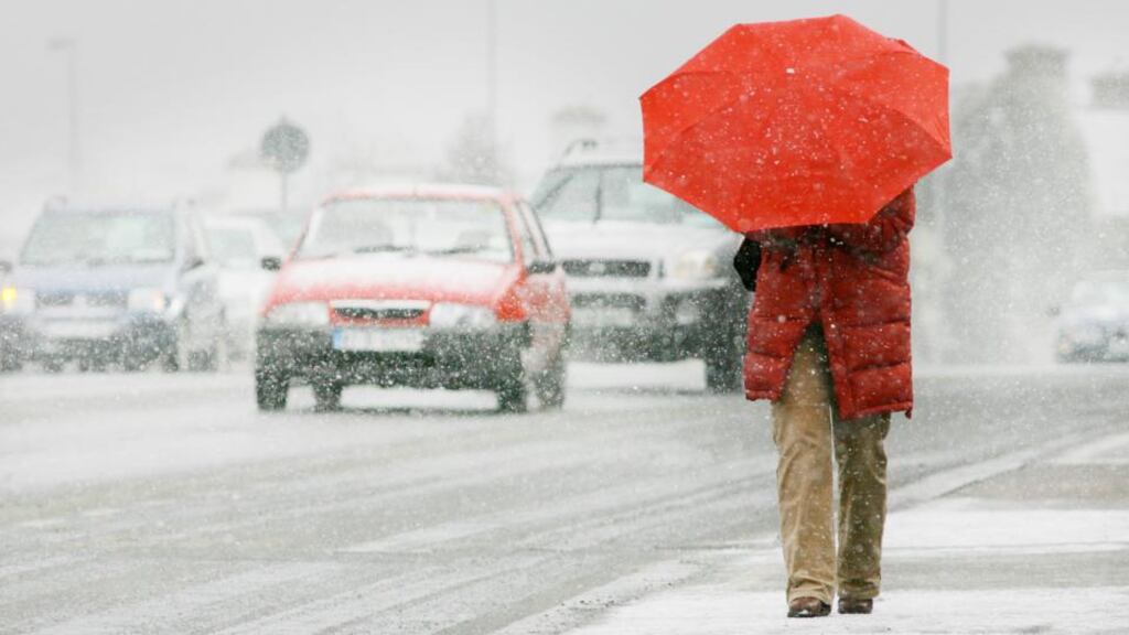 A pedestrian fights her way through blizzard like conditions by the Stillorgan dual carriageway. Archive photograph: Bryan O’Brien/The Irish Times