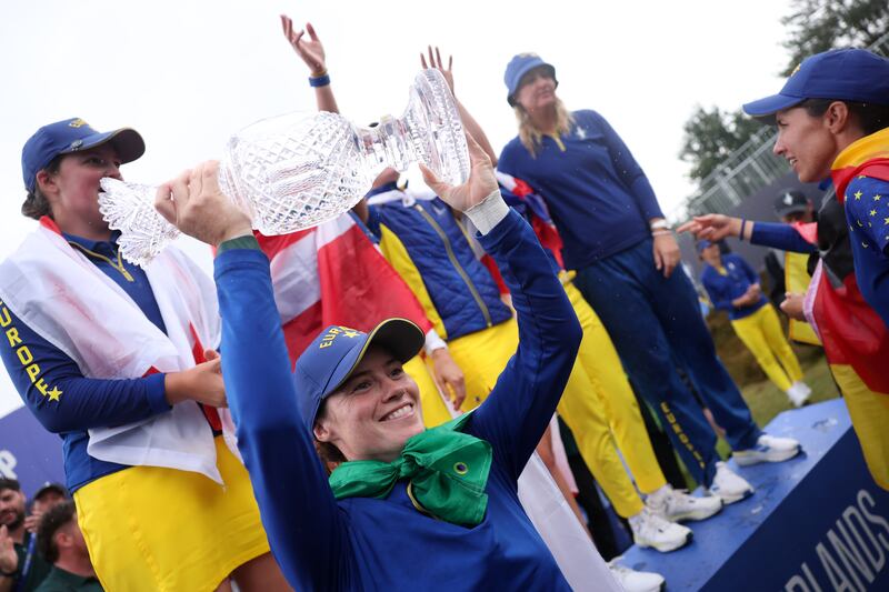 Leona Maguire celebrates with the Solheim Cup after Europe's win over the USA. Photograph: Kate McShane/Getty Images