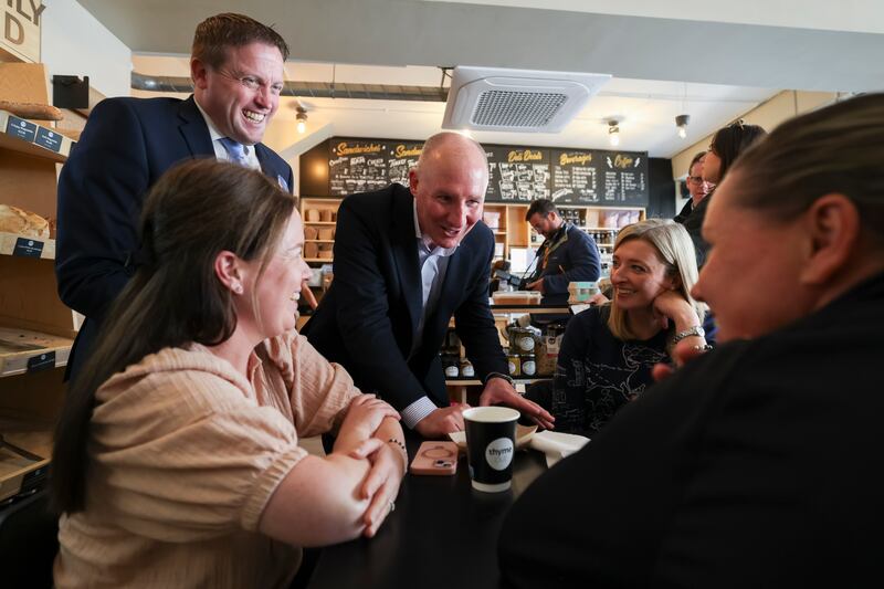 Jim Gavin, centre, chats to voters in a cafe in South Dublin. Photograph: Dan Dennison