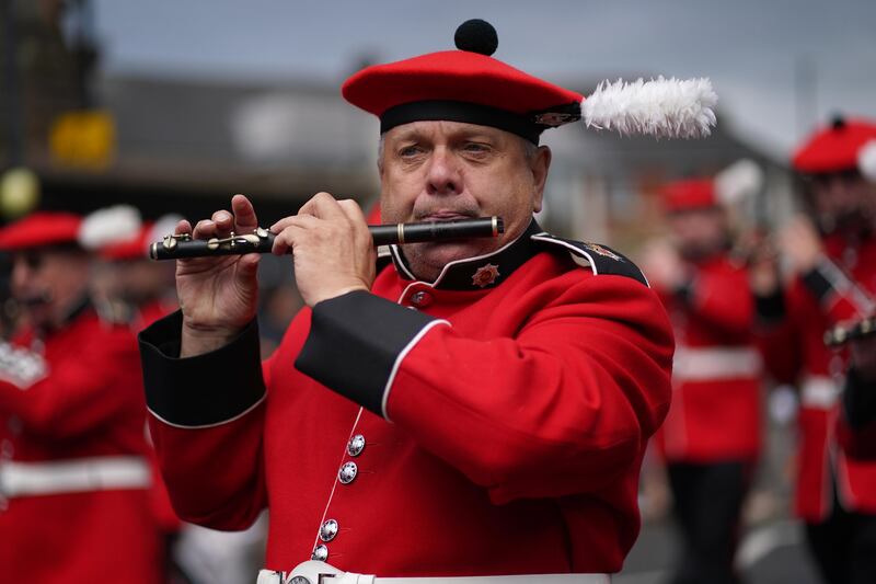 Marching bands take part in an Orange Order parade in Belfast as part of the Twelfth of July celebrations. Photograph: Brian Lawless/PA Wire