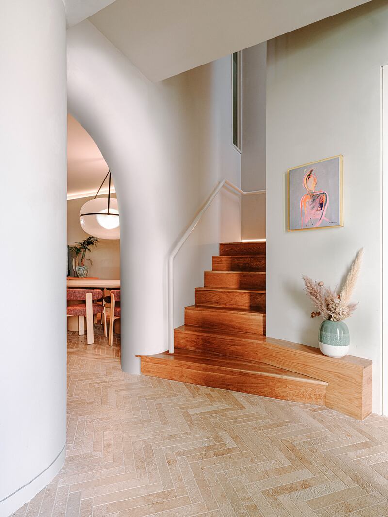 The couple flipped the direction of the original staircase, concealing most of it from view.  Photograph Max Fedorov