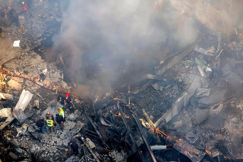 Firefighters attempt to extinguish a fire following an Israeli strike at the Corniche al-Mazraa neighbourhood of Beirut on Wednesday. Photograph: Ibrahim Amro/AFP via Getty