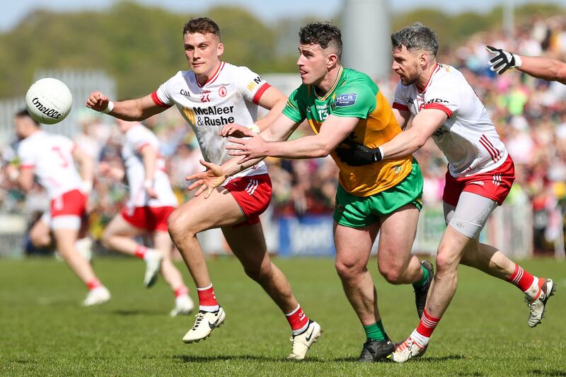 Donegal's Patrick McBrearty with Tyrone's Matthew Donnelly and Colm Kilpatrick. Photograph: Lorcan Doherty/Inpho 