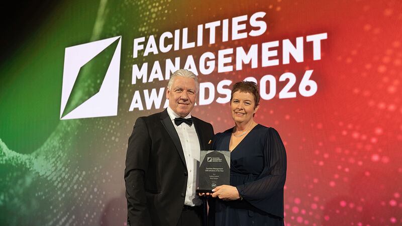 Eric Doyle, managing director, ISS Ireland, presents the facilities management CSR initiative of the year award to Deirdre Saunders, Sodexo Ireland
