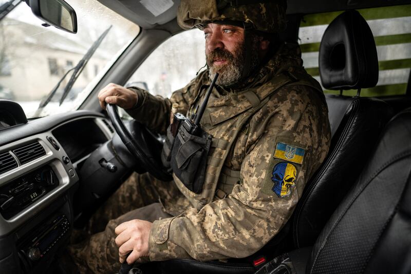 A Ukrainian soldier with the call sign Badger prepares to head to a frontline position from a base in the Donbas region of eastern Ukraine on Wednesday, February 1st, 2023. Photograph: Lynsey Addario/The New York Times