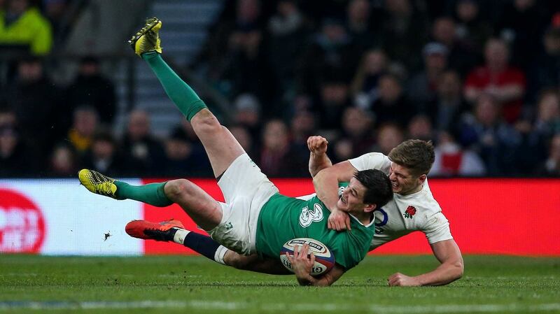 Ireland’s Jonathan Sexton is tackled by England’s Owen Farrell during the 2016 Six Nations. Photograph: Billy Stickland/Inpho
