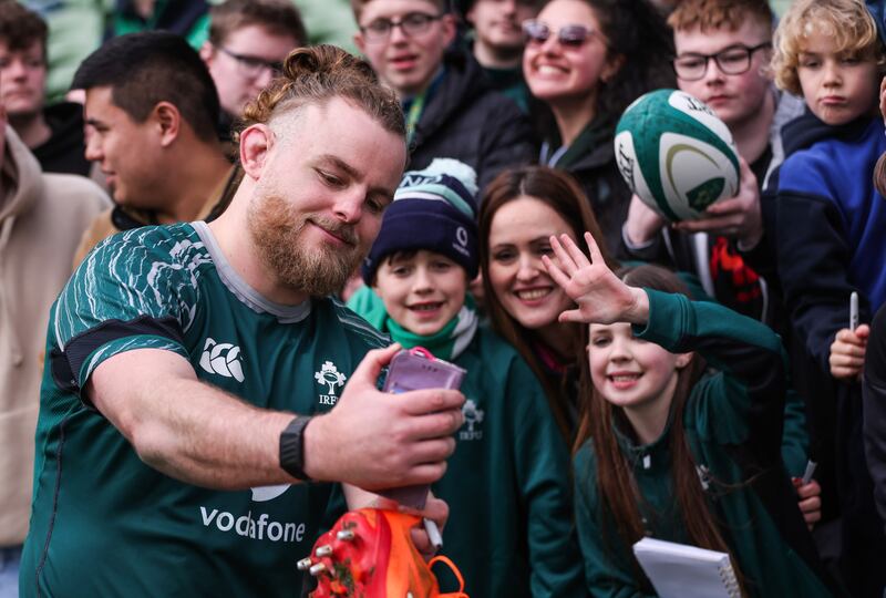 Finlay Bealham with some fans during a recent Ireland open training session at the Aviva. Photograph: Tom Maher/Inpho
