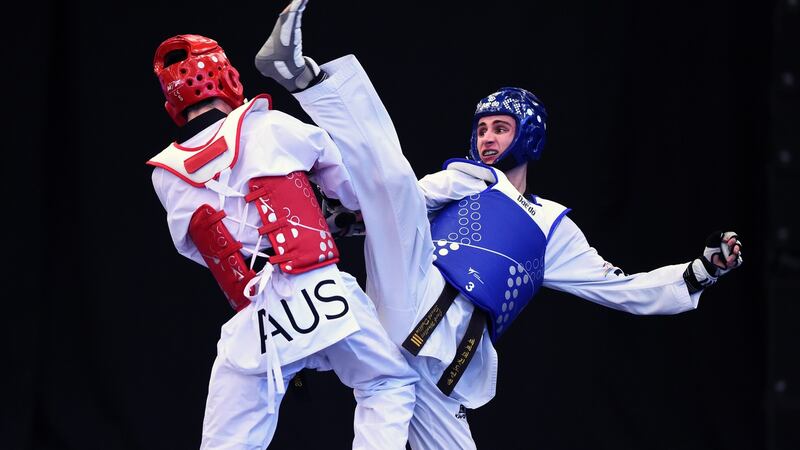 Jack Woolley of Ireland in action against Bailey Lewis of Australia during the WTF World Taekwondo Grand Prix 2018 at Manchester Arena, England. Photograph: Nathan Stirk /Getty Images