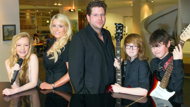 Musical directors Trish and Karl Rooney with Members of the Academy of Popular Music Junior Band in the Cork School of Music: Holly O’Connor, Cian Mullane, Jake O’Driscoll. Photograph: Michael Mac Sweeney/Provision
