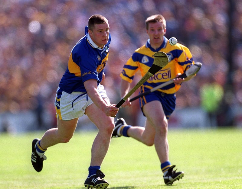 James O'Connor  chases down John Carroll during the 2001 Munster  semi-final. "For us 2001 was one that got away. We had savage work done. We had poured everything into it." Photograph: Patrick Bolger/Inpho