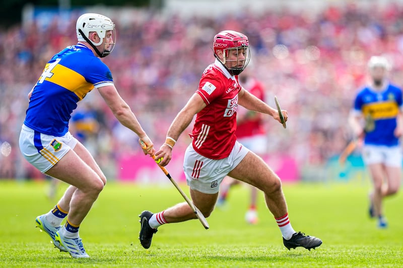 William Buckley of Cork is tackled by Michael Breen of Tipperary. Photograph: James Lawlor/Inpho