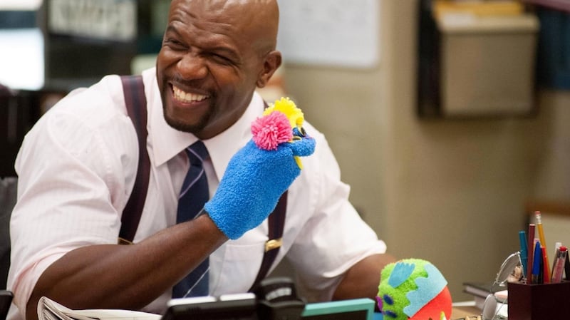 Terry Crews plays the beefed up, yoghurt loving, doting father sergeant Terry Jeffords in Brooklyn 99. Photograph: Eddy Chen/Fox