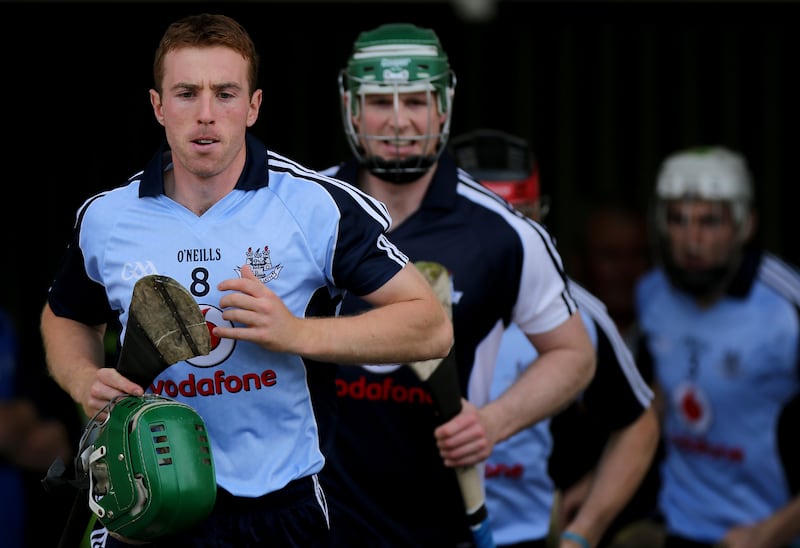 Dublin's captain John McCaffrey leads out his team for the Leinster GAA Hurling Senior Championship Semi-Final Replay against Kilkenny in 2013
©INPHO/James Crombie