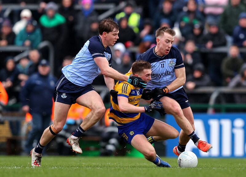 Roscommon's Dylan Ruane with Charlie McMorrow and Seán Bugler of Dublin. Photograph: Tom O’Hanlon/INPHO