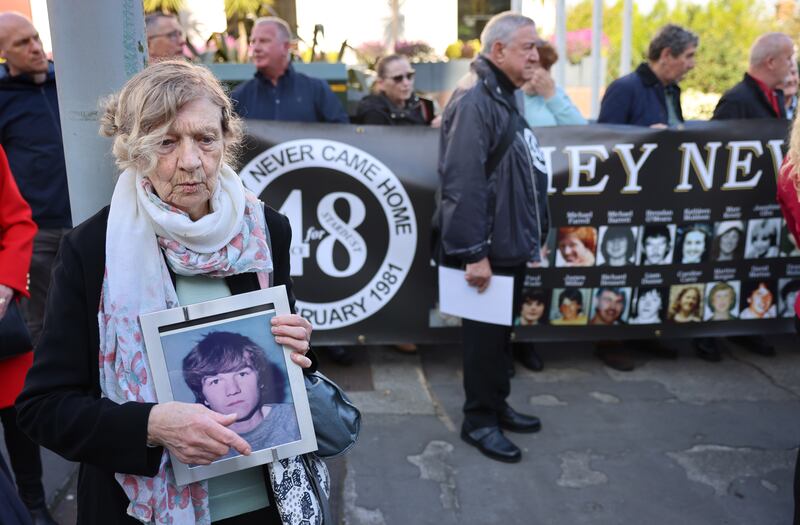 Gertrude Barrett, holds a photograph of her son Michael.
Photograph: Dara Mac Dónaill / The Irish Times

