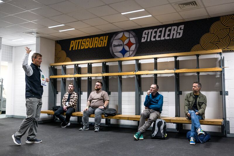 Gordan Manning (right) listens as NFL chief medical officer Dr Allen Sills talks through the medical set-up ahead of the game. Photograph: Laszlo Geczo/Inpho