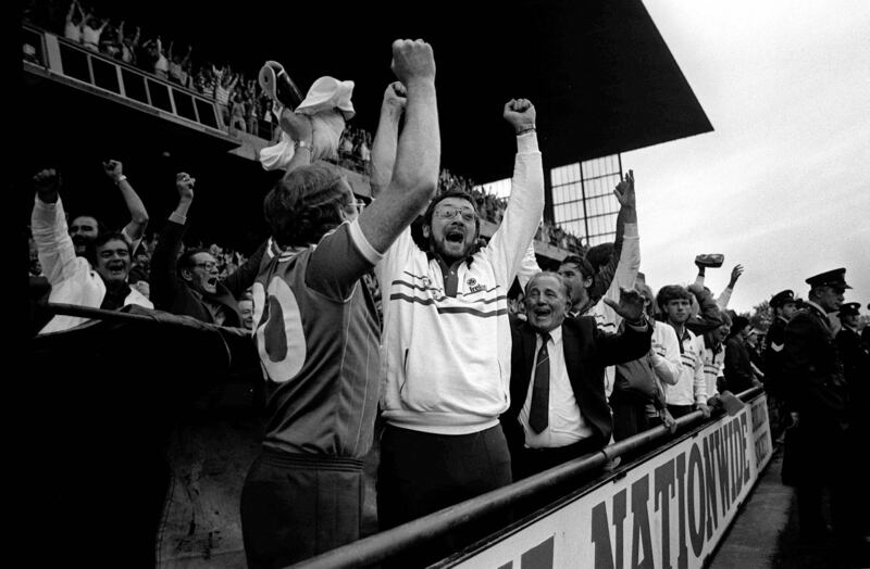 Eoin Hand and the Irish bench celebrate during an Ireland v Russia game in 1984. When he became Ireland's manager in 1980 Hand's salary was £9,500. Photograph: Billy Stickland/Inpho