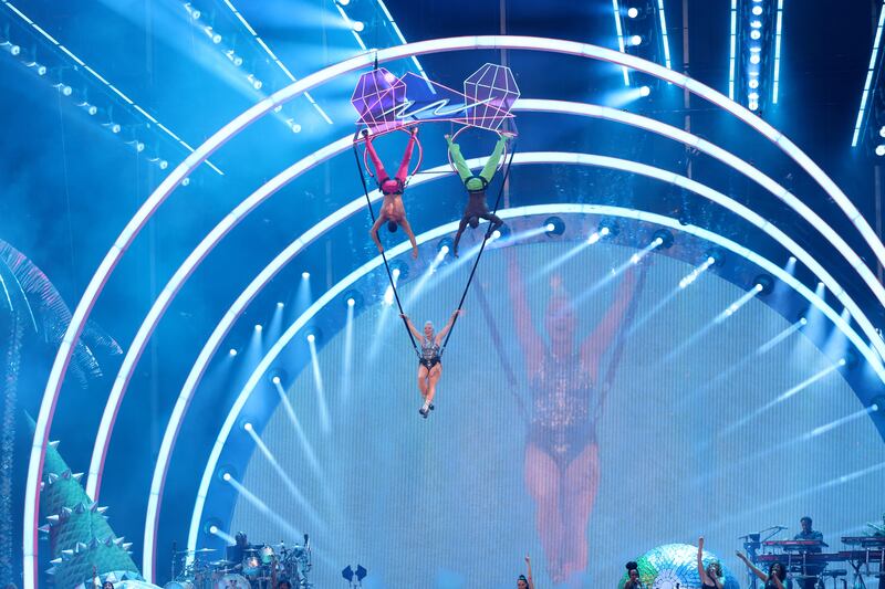 Pop superstar Pink zipping across the Aviva Stadium on an aerial wire. 
Photograph: Laura Hutton
