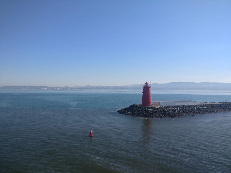 Passing Poolbeg Lighthouse, at the end of the Great South Wall, in Dublin Bay. Photograph: Michael Pidgeon