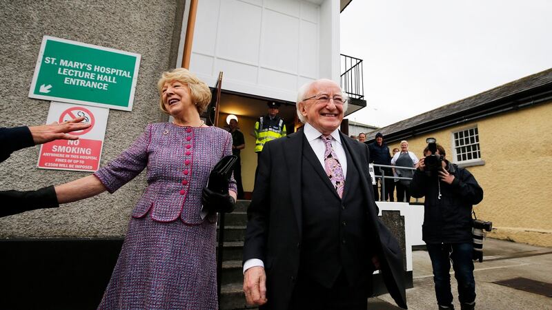 President Michael D Higgins and his wife Sabina seen after casting their  votes in the presidential election and blasphemy referendum on Friday.  Mr Higgins  has received the largest personal mandate in the history of the State. Photograph: The Irish Times