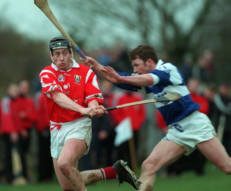 Pat Ryan in action for Cork against Laois's Cyril Cuddy during a league clash in 1999. He was part of the squad that saw Cork end a nine-year wait by claiming the All-Ireland title later the same year. Photograph: Lorraine O'Sullivan/Inpho