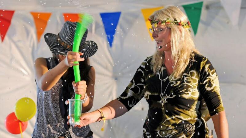 Science presenter Sue McGrath, better known as Scientific Sue, has developed a highly entertaining show explaining how dragons work. Here she is at work at the  Electric Picnic in 2012. File photograph: Dave Meehan/The Irish Times