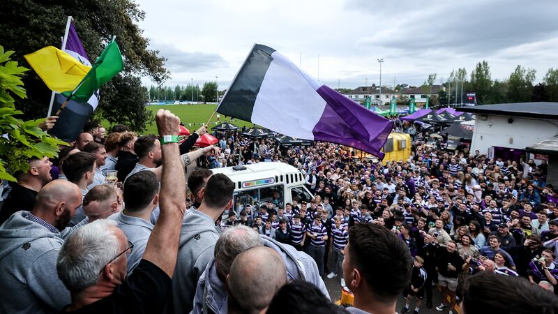 The Terenure team celebrate with the Division 1A trophy with supporters at Lakelands Park, Dublin, in May 2023. Photograph: Ben Brady/INPHO