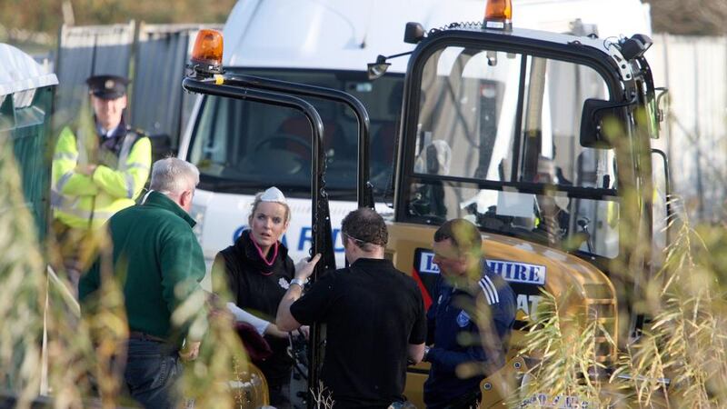 Garda search units with heavy machinery at the Walsh’s family home in Carna, Co  Galway. Photograph: Hany Marzouk