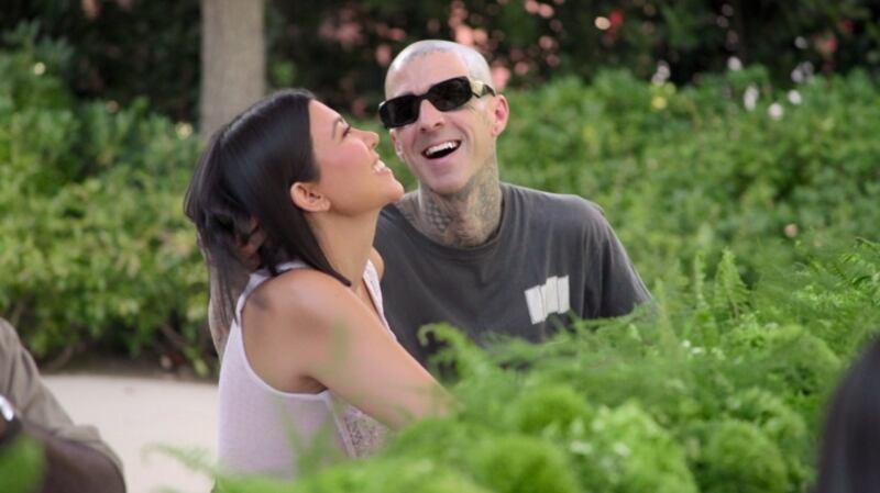 Kourtney and Travis kanoodle in the new series of The Kardashians. Photograph:  Hulu