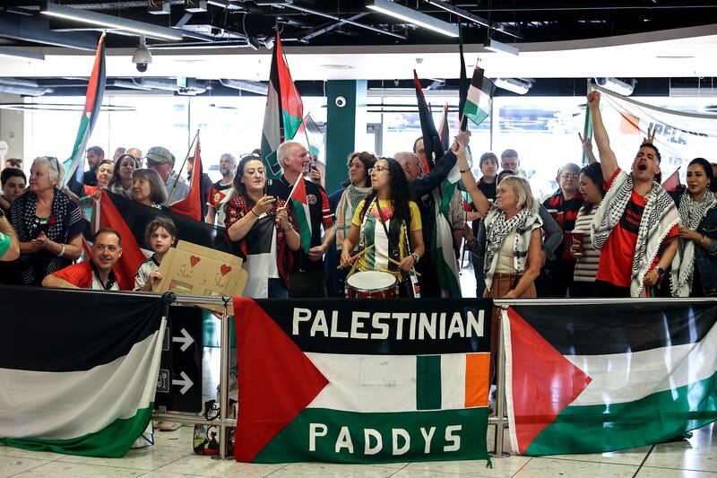 Palestine supporters were full of enthusiasm at Dublin Airport on Sunday. Some 4,500 fans are expected to attend Wednesday's game in Dalymount Park. Photograph: Ben Brady/Inpho