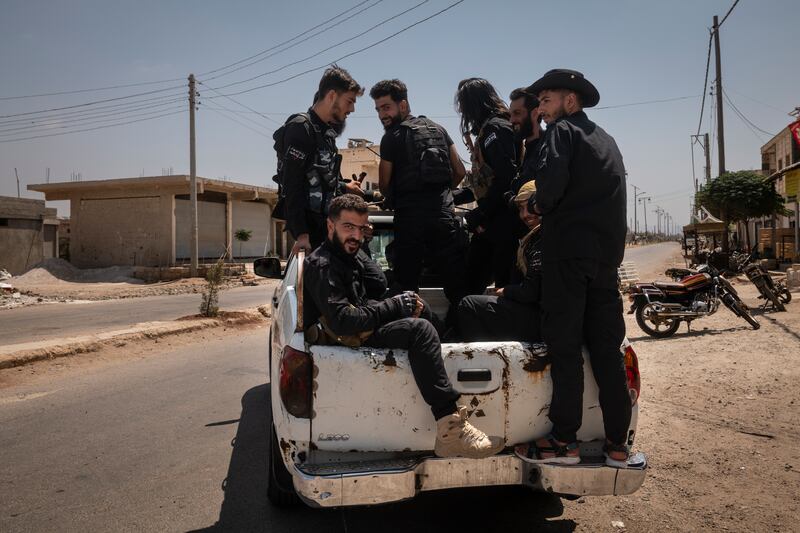 Syrian government troops in the town of Buser al Harir, Syria, during a ceasefire at the end of last month. Photograph: Nicole Tung/The New York Times
                      