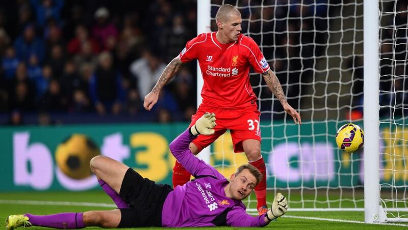 Martin Skrtel of Liverpool looks on as Simon Mignolet unwittingly of Liverpool scores an own goal against Leicester City   at The King Power Stadium. Photograph: Shaun Botterill/Getty Images
