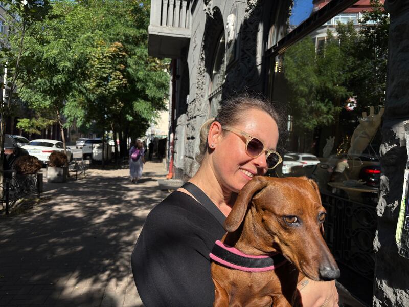 Lesia Mazanik, who lives in Kyiv, holding her dog Lambada. Photograph: Jack Power