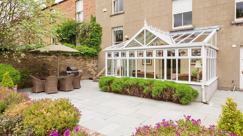 The owners had the house reroofed and repointed, had sash windows reconditioned, cornicings repaired, floors polished and a conservatory added