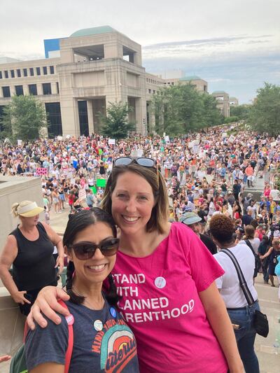 Caitlin Bernard with Dr Tracey A Wilkinson (left), a paediatrician involved with Indiana’s chapter of the Reproductive Health Advocacy Project, at a rally for abortion rights at the Indiana statehouse on June 25th