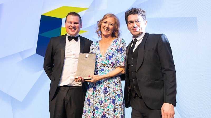 Tomás Mac Eoin, managing director, McKeon Group, presents the Fit Out Designer of the Year award to Anne-Marie Saul-Rotne, SaulDesign Architecture & Interiors.