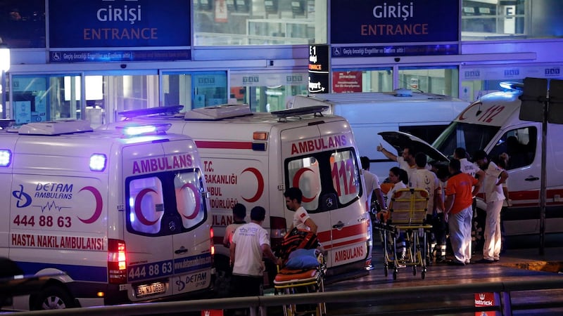 Turkish bombings: Medics helping wounded people after a suicide bomb attack at Ataturk Airport in Istanbul, Turkey. Photograph: EPA