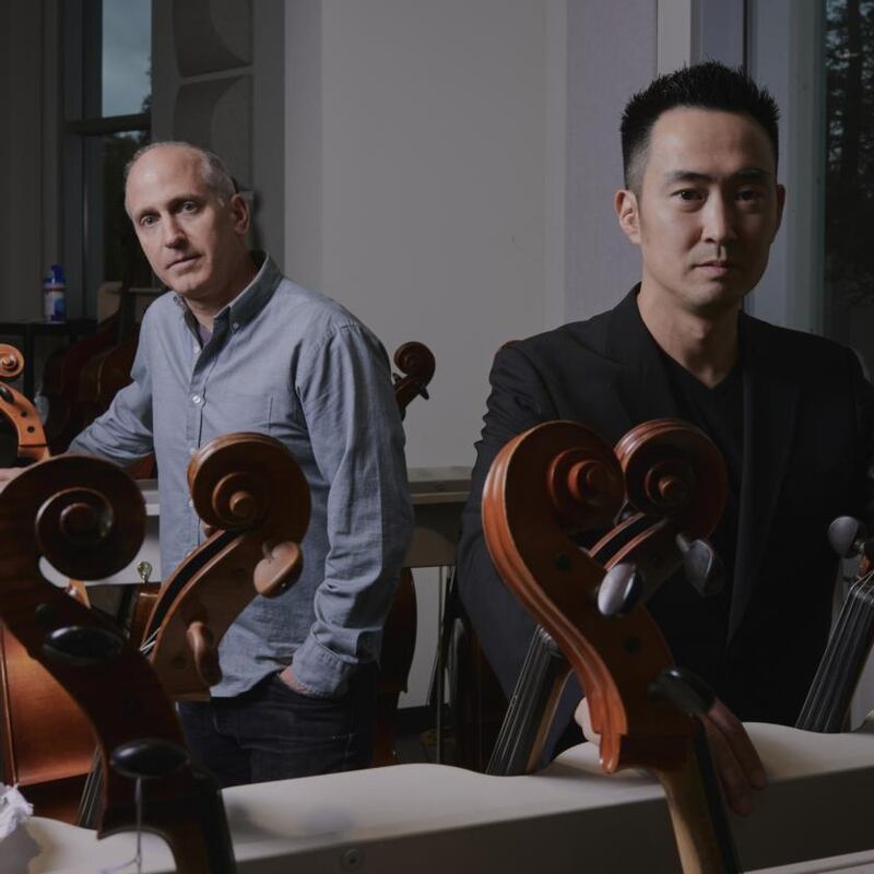 Julian Hersh (left) and Jonathan Koh, partners in the crypto-based firm Musikhaus, which possesses a Soffritti cello once owned by Jeffrey Epstein.  Photograph: Peter Prato/The New York Times