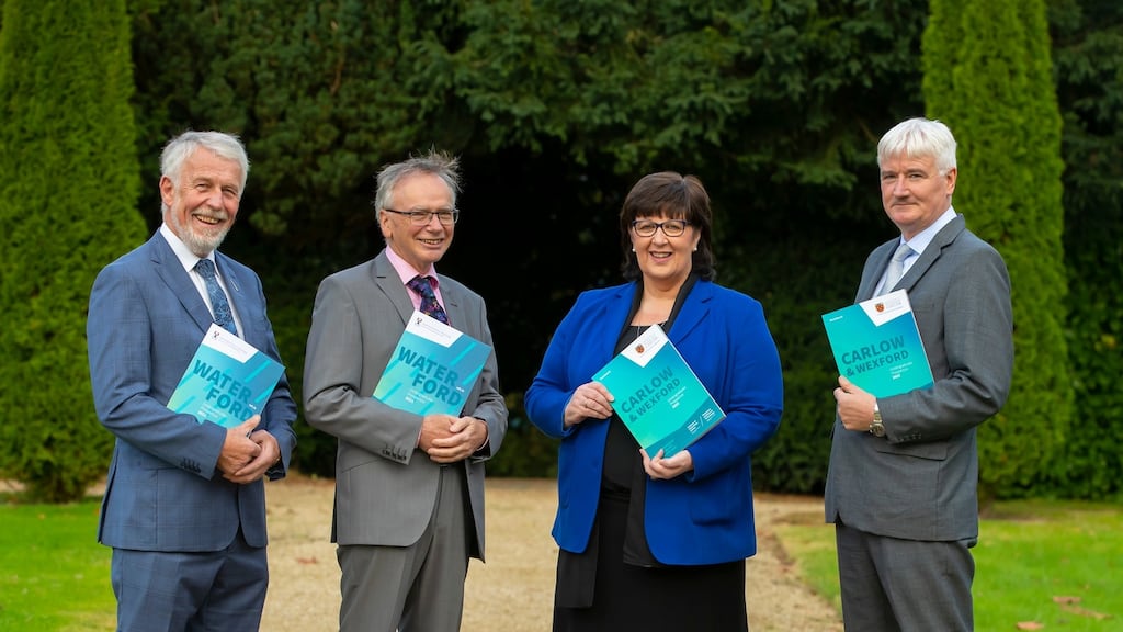 Pictured from left are chair of Waterford Institute of Technology (WIT) governing body, Jim Moore; president of WIT Prof Willie Donnelly; president of IT Carlow Dr Patricia Mulcahy; chair of IT Carlow governing body, John Moore. Photograph: Patrick Browne