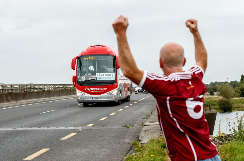 Joe Canning and his Galway team-mates are cheered on their way home after winning the 2017 All-Ireland final. Photograph: James Crombie/Inpho