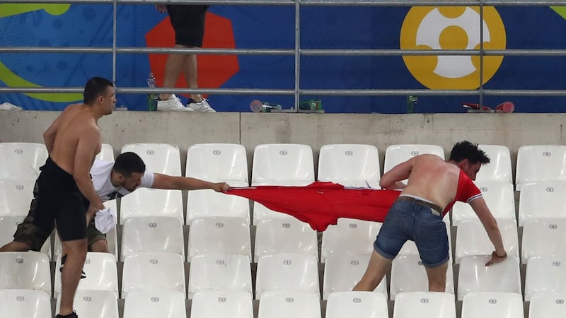 Fans clash during the Euro 2016  match between England and Russia at Stade Velodrome  in Marseille, France. Photograph:  Lars Baron/Getty Images
