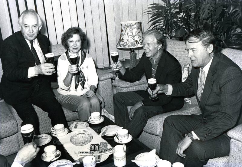 Former US president and first lady Jimmy and Rosalynn Carter sample an Irish coffee at Shannon Airport 