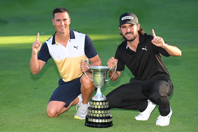 Angel Hidalgo and his caddie with the trophy after his victory in the Spanish Open at Club de Campo Villa de Madrid. Photograph: Stuart Franklin/Getty Images