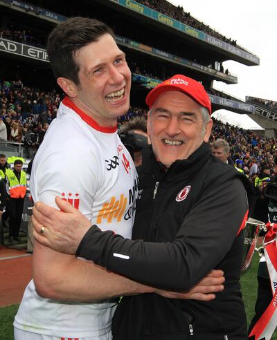 Tyrone's Seán Cavanagh and manager Mickey Harte celebrating one of Tyrone's many glory days in Croke Park. Photograph: Lorraine O'Sullivan/Inpho